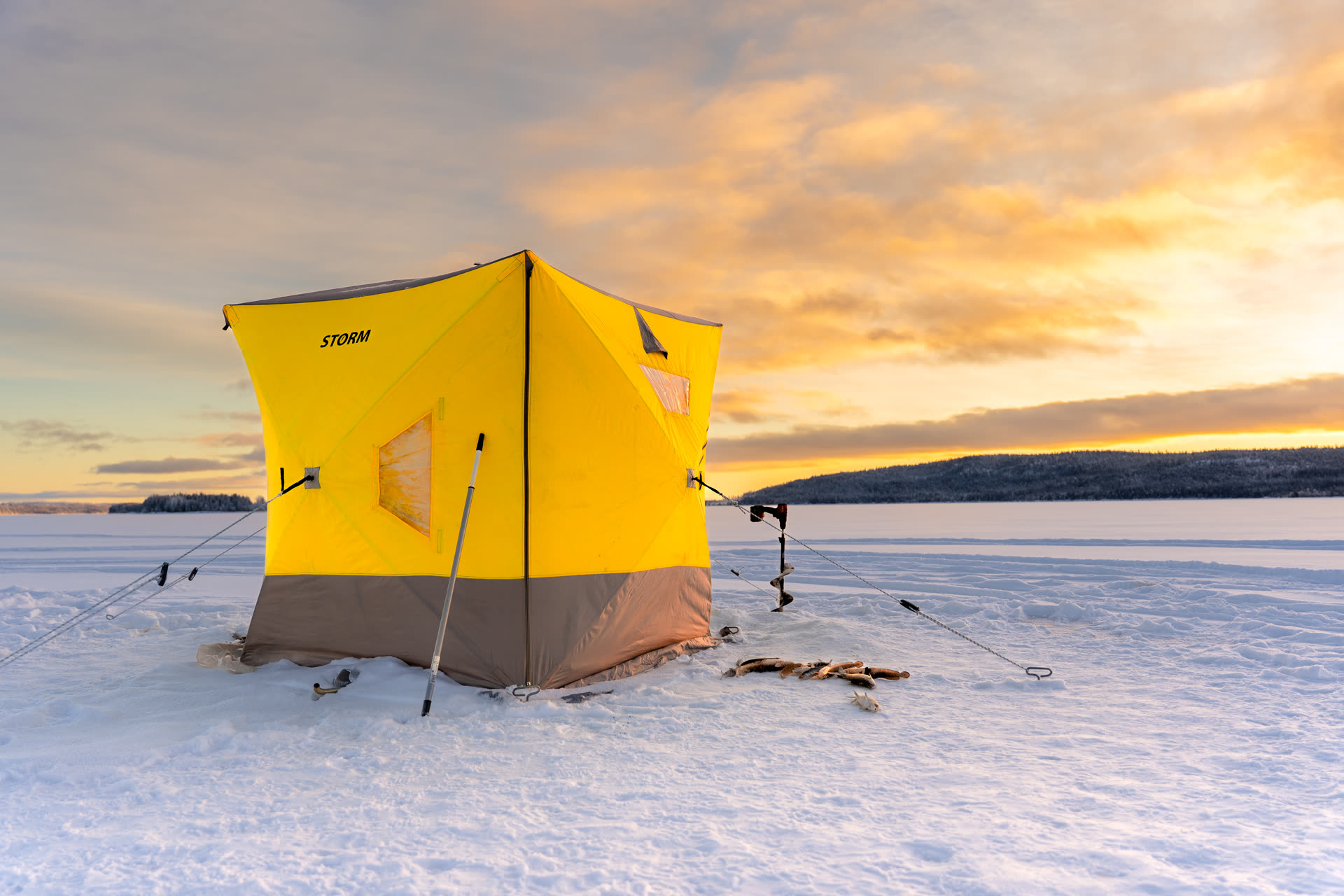 Winter fishing Swedish Lapland